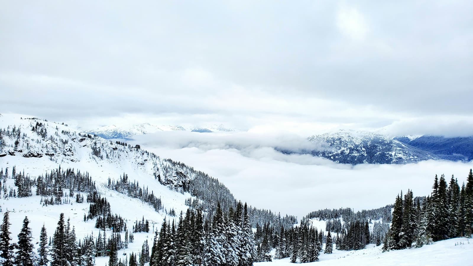 Ski slopes above a sea of cloud at Whistler